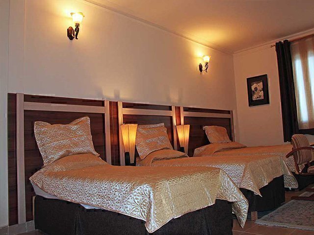 عکس تخت اتاق هتل هلیا کیش