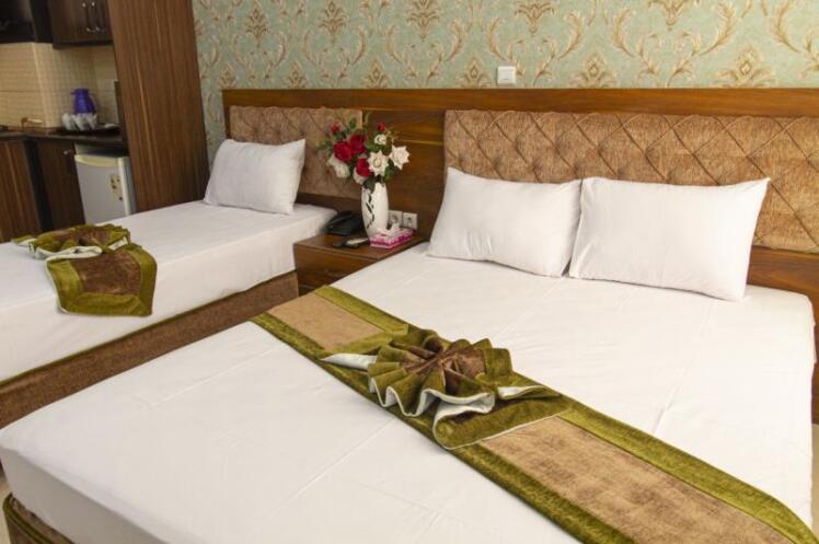 تور مشهد زمینی با قطار -هتل ایوان 2 -رزرو هتل ایوان 2-عکس هتل ایوان 2-امکانات هتل ایوان 2-رستوران هتل ایوان 2-استخر هتل 